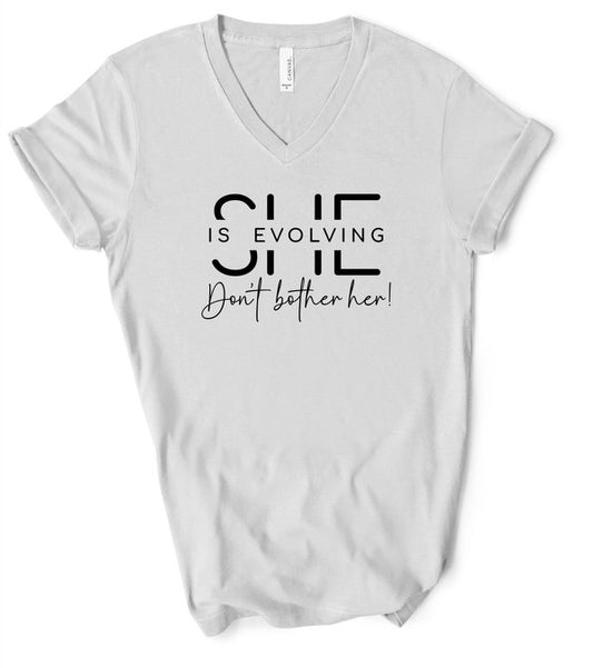 V-Neck She Is Evolving Graphic Boutique Tee