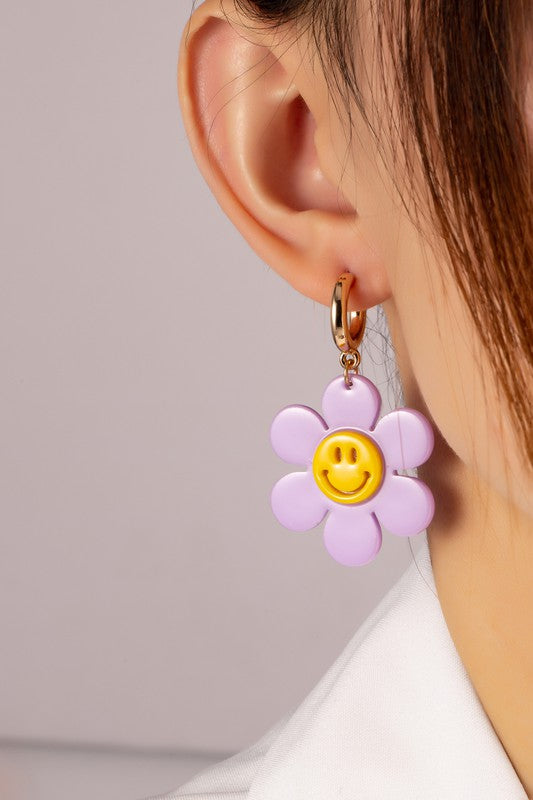 Huggie hoop dangling flower smiley face earrings