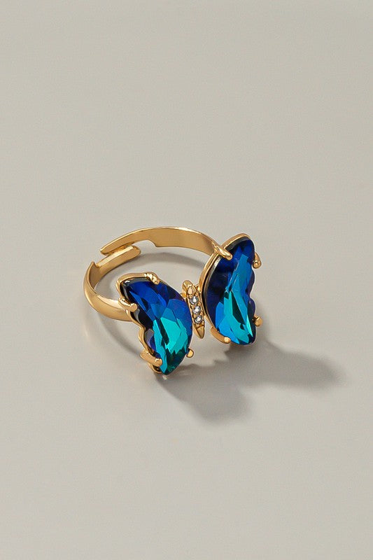 Butterfly ring with adjustable brass band