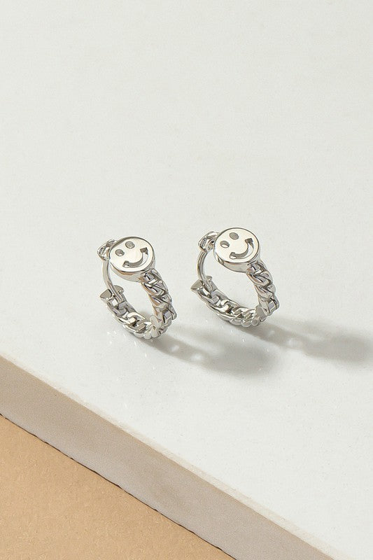 Smiley face huggie hoop earrings