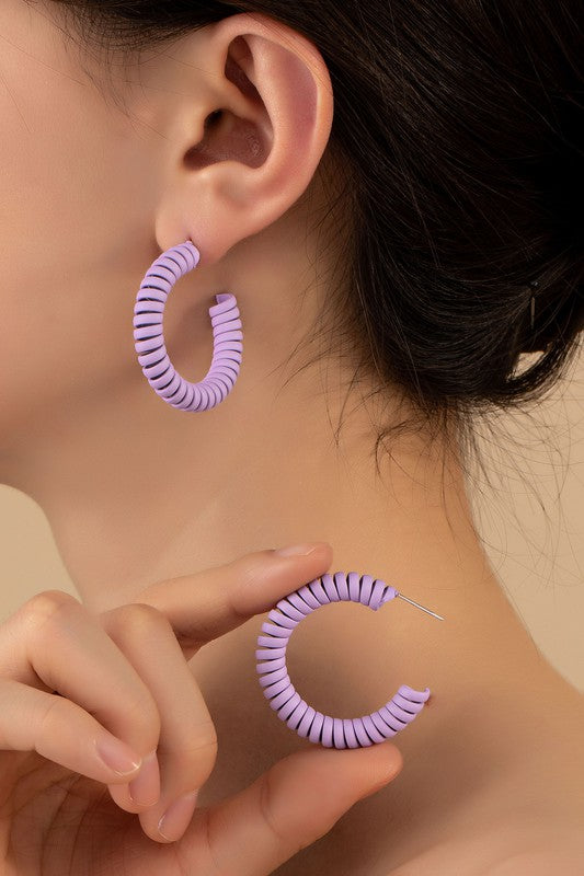 Spiral metal hoop earrings with color coating