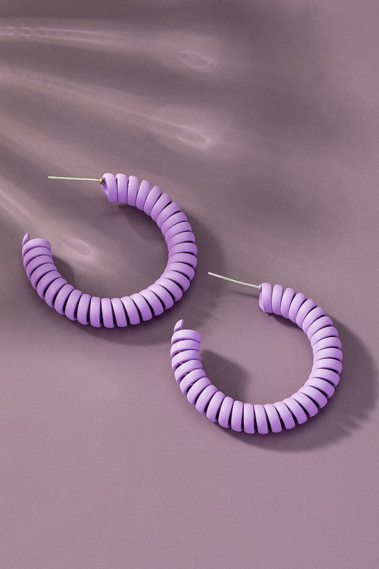 Spiral metal hoop earrings with color coating