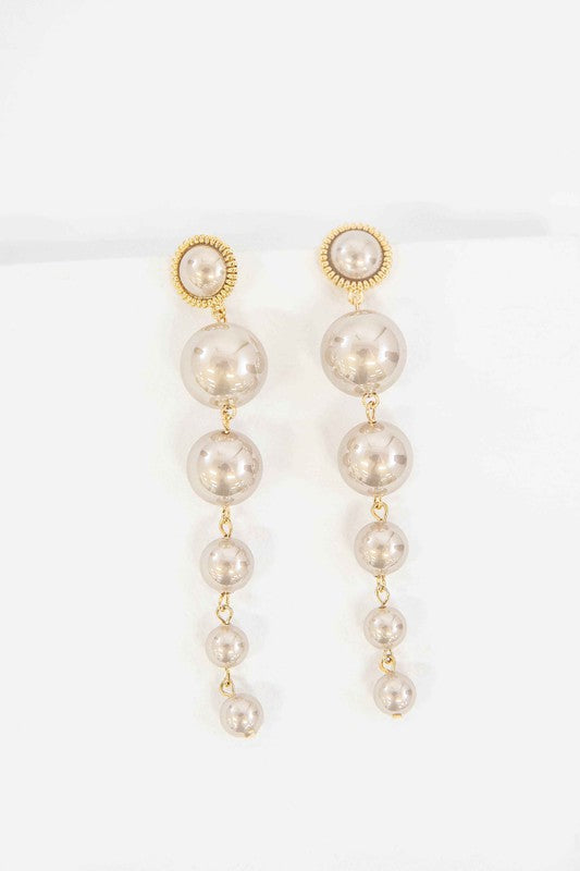 Sun Pearl Dangle Earrings