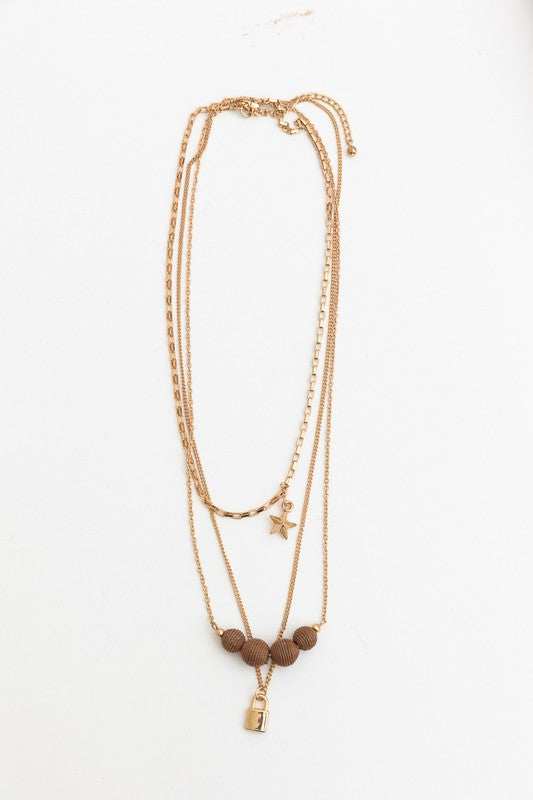 Three Layered Rustic Gold Charmed Necklace